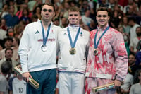 | Photo: AP/Matthias Schrader : Leon Marchand, center with Kristof Milak, left, and Ilya Kharun